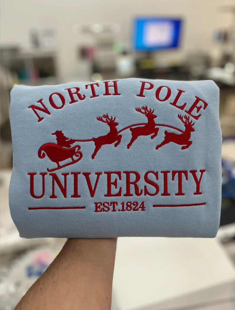 North Pole University Christmas Embroidered Sweatshirt, Holiday Apparel, Holiday Sweatshirt, Cozy Christmas Embroidery, Christmas Gifts